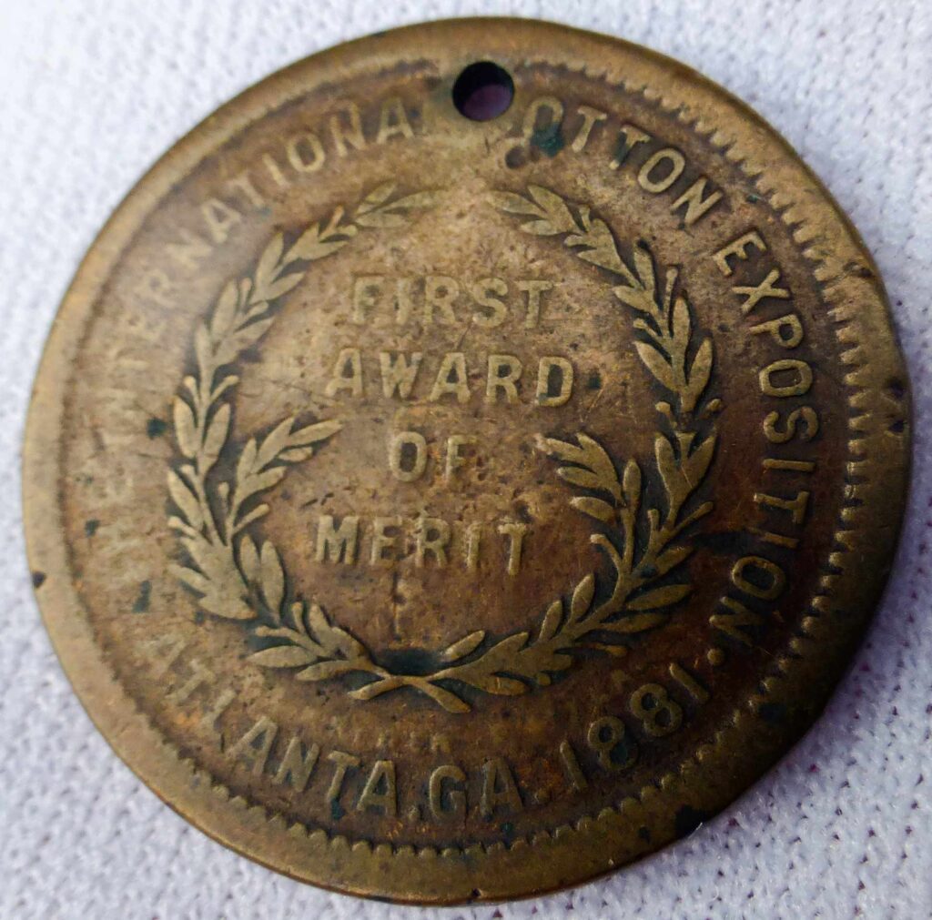 award medal token 1881 International Cotton Exposition